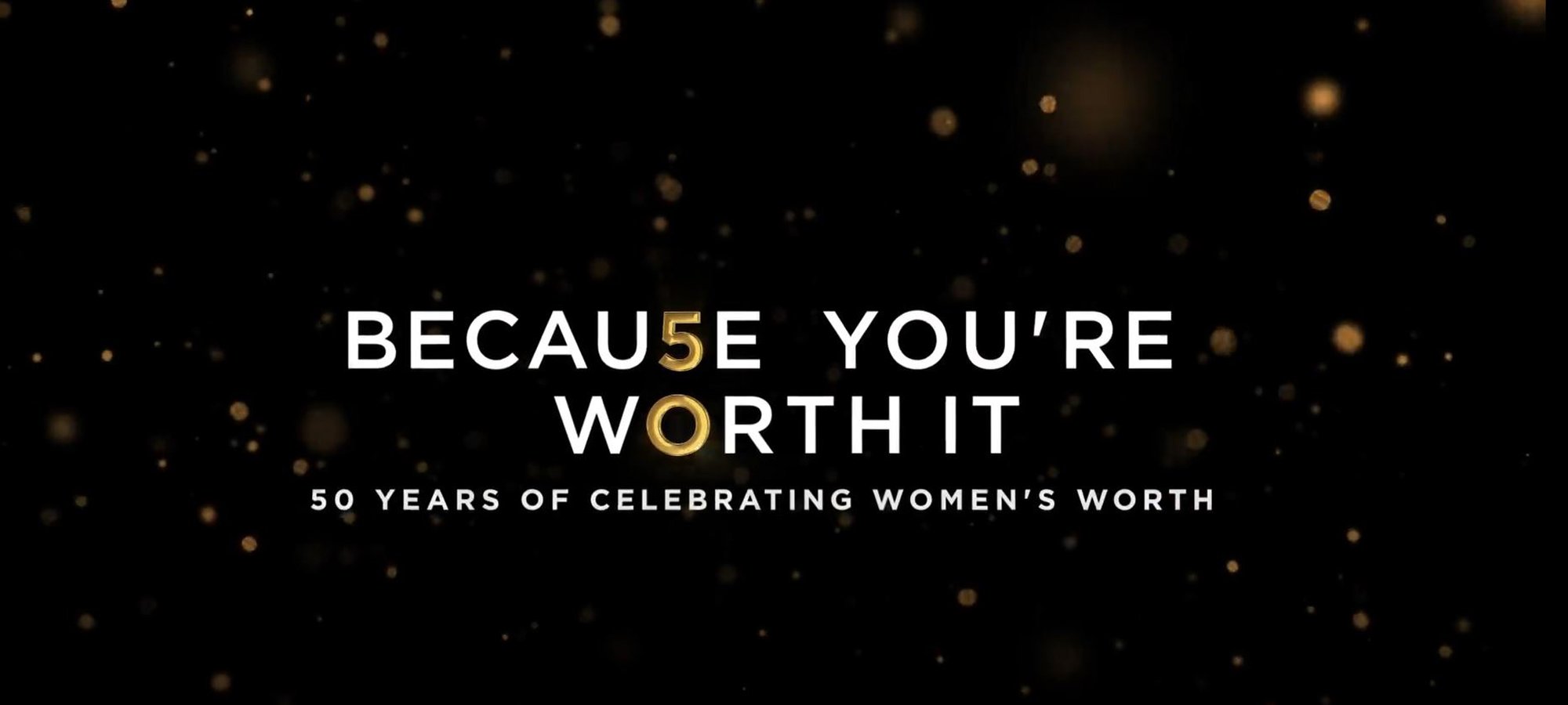 Texto "Because you're worth it" em fundo preto